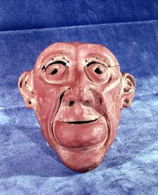 Brest mask made of clay of 14 cm in height, comes from the archaeological site of Tlatilco, in th…