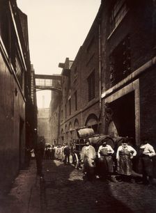 Brewery workers outside the Combe & Co's Brewery, Castle Street, St Giles Circus, London, c1875. Creator: Unknown