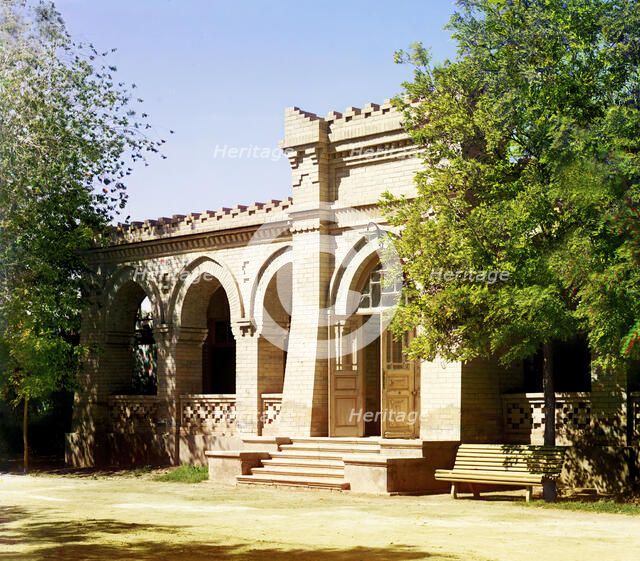Brick building with arched entrance and arcade, between 1905 and 1915. Creator: Sergey Mikhaylovich Prokudin-Gorsky.