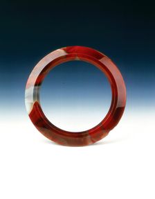Brick-red agate pectoral ring, Western Han dynasty, 206 BC-8 AD. Creator: Unknown