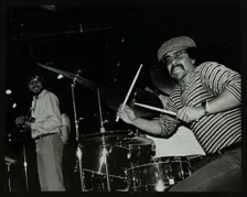 Brian Abrahams (drums) and Guy Barker (trumpet) on stage at The Stables, Wavendon, Buckinghamshire. Creator: Denis Williams