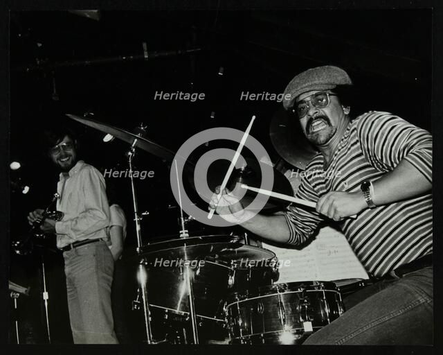 Brian Abrahams (drums) and Guy Barker (trumpet) on stage at The Stables, Wavendon, Buckinghamshire. Artist: Denis Williams