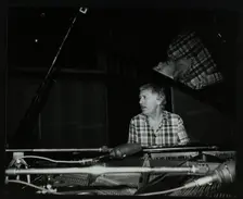 Brian Dee on the piano, Lansdowne Studios, Holland Park, London, 1989. Creator: Denis Williams