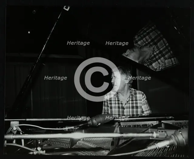 Brian Dee on the piano, Lansdowne Studios, Holland Park, London, 1989. Creator: Denis Williams.