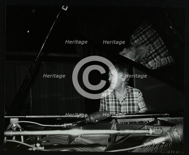 Brian Dee on the piano, Lansdowne Studios, Holland Park, London, 1989. Creator: Denis Williams.