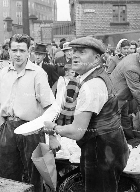 Bric-a-brac stall, Sneinton Market, Nottingham, Nottinghamshire, c1950(?). Creator: Edgar Lloyd.