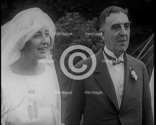 Bride and Groom Standing for Photographs, 1921. Creator: British Pathe Ltd.