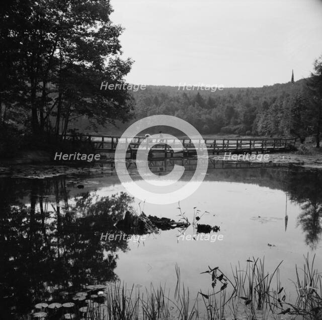 Bridge and background scenery, Camp Gaylord White, Arden, New York, 1943. Creator: Gordon Parks.