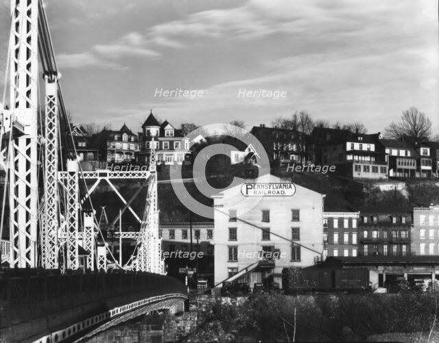 Bridge and houses in Phillipsburg, New Jersey; seen from Easton, Pennsylvania, 1935. Creator: Walker Evans.