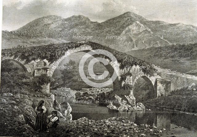 Bridge in Cangas de Onis on the River Sella and the hermitage of Santa Cruz, lithograph of the wo…