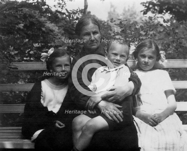 Briner Julius with his grandmother Anna Timofeevna Blagovidova, sisters Vera and Irina, 1924. Creator: Unknown.