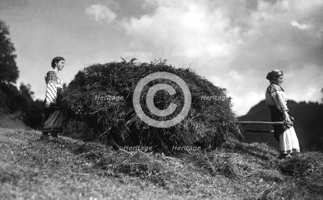 Bringing in the harvest, Bistrita Valley, Moldavia, north-east Romania, c1920-c1945. Artist: Adolph Chevalier