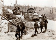 British 8th Army troops and tanks on the road to Ferrara, Italy, April 1945. Creator: Unknown