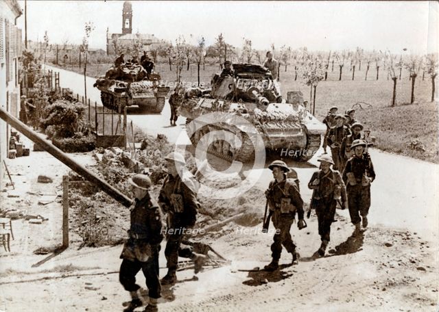 British 8th Army troops and tanks on the road to Ferrara, Italy, April 1945. Creator: Unknown.