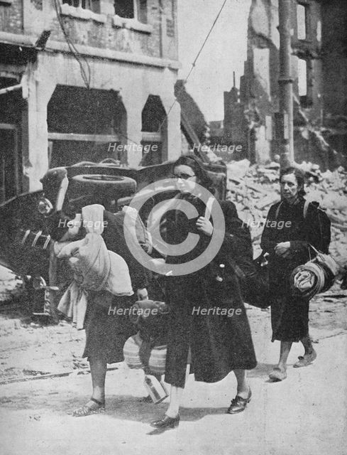 'British troops hold out in Louvain as refugees leave the city', 1940, (1940). Artist: Unknown.