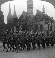 British troops marching in Cologne, Germany, 1918-1926.Artist: Realistic Travels Publishers