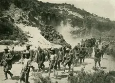 British troops with Turkish prisoners, First World War, 1915, (c1920). Creator: Unknown