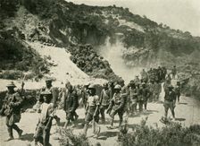 British troops with Turkish prisoners, First World War, 1915, (c1920). Creator: Unknown