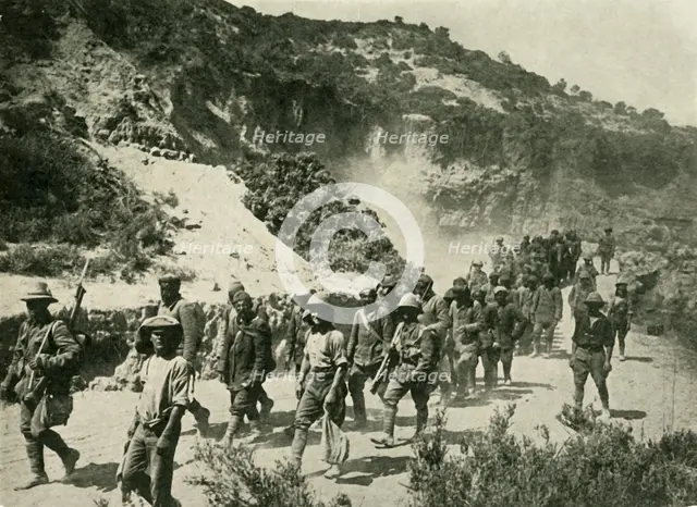 British troops with Turkish prisoners, First World War, 1915, (c1920).  Creator: Unknown.