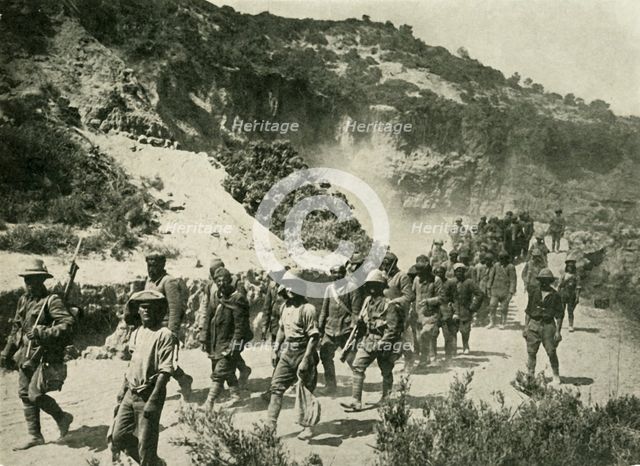 British troops with Turkish prisoners, First World War, 1915, (c1920).  Creator: Unknown.