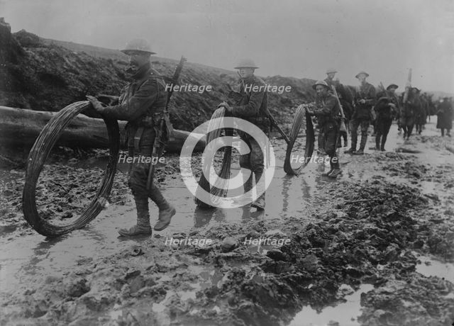 British wiring parties in rain, Sept 1916. Creator: Bain News Service.