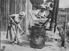British women tending fat boilers at front, 24 Jul 1917. Creator: Bain News Service