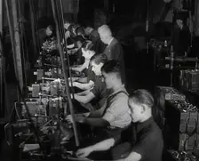 British Workers in a Factory, 1941. Creator: British Pathe Ltd