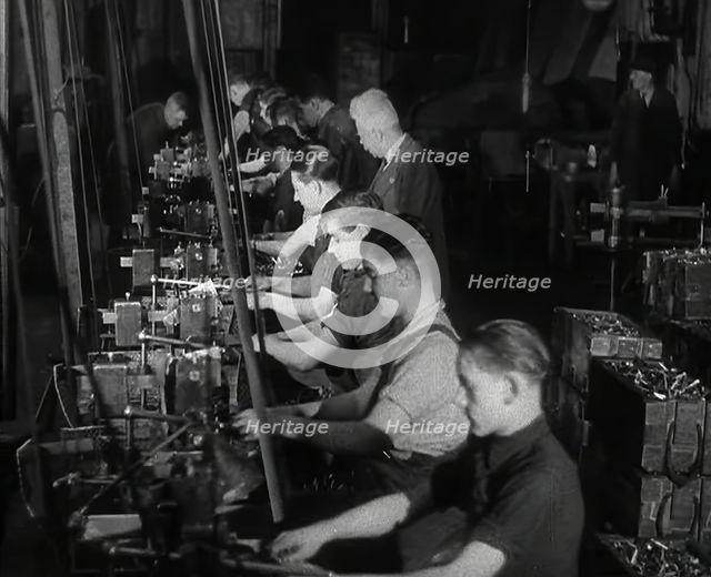 British Workers in a Factory, 1941. Creator: British Pathe Ltd.