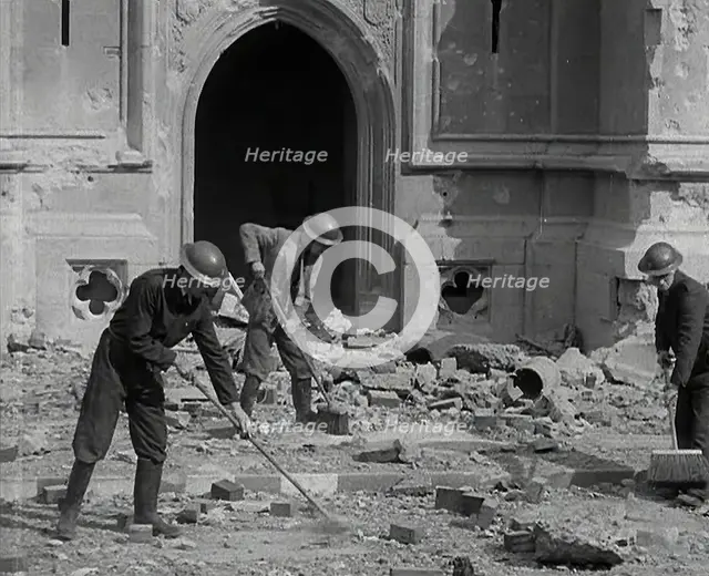 British Air Raid Wardens Clearing up Rubble Around the Palace of Westminster, 1941. Creator: British Pathe Ltd.