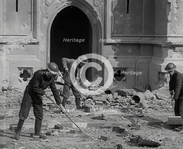British Air Raid Wardens Clearing up Rubble Around the Palace of Westminster, 1941. Creator: British Pathe Ltd.
