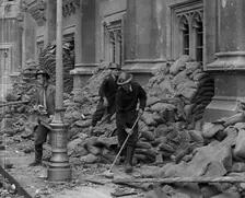 British Air Raid Wardens Clearing up Rubble Around the Palace of Westminster, 1941. Creator: British Pathe Ltd