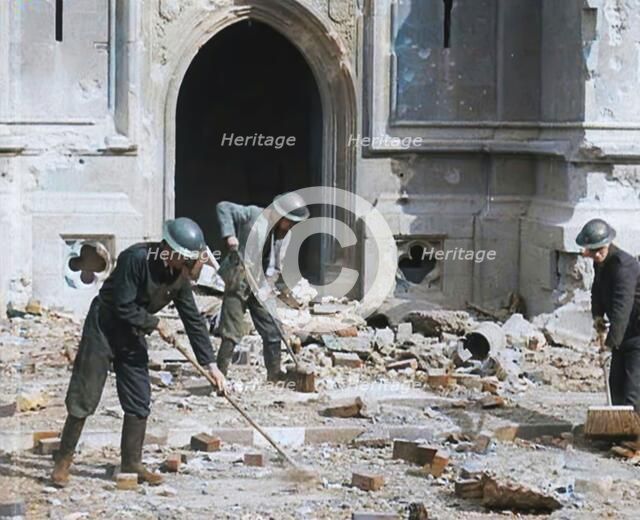 British Air Raid Wardens Clearing up Rubble Around the Palace of Westminster, 1941. Creator: British Pathe Ltd.