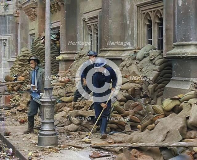 British Air Raid Wardens Clearing up Rubble Around the Palace of Westminster, 1941. Creator: British Pathe Ltd.