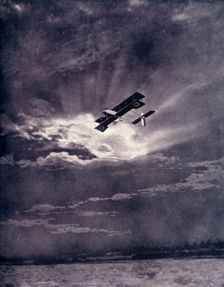 British Airman Returning at Sunset After Successful Journey 1917. Creator: Unknown