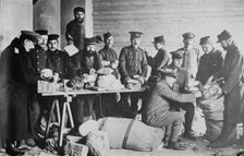 British and French prisoners assorting mail, between 1914 and c1915. Creator: Bain News Service