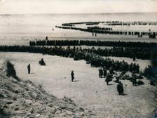 British and French troops wait on the dunes to be evacuated, Dunkirk, 1940