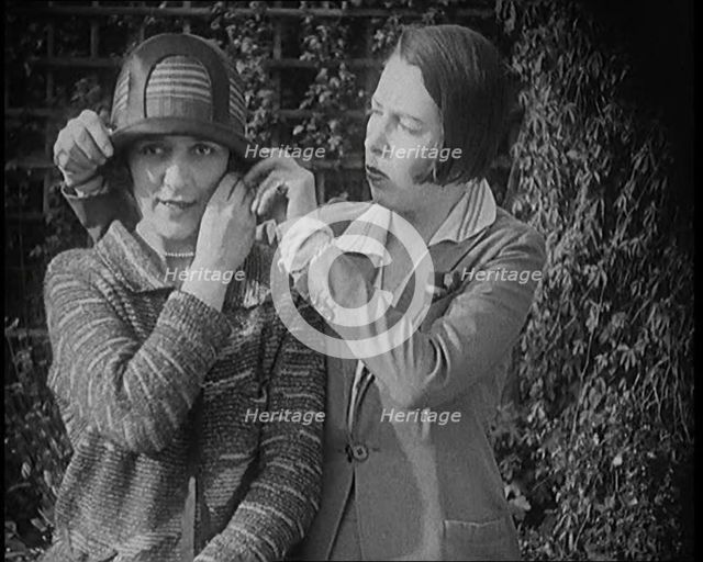 British Artists Norah Blaney and Gwen Farrah Posing for the Camera Smiling at Each Other, 1920. Creator: British Pathe Ltd.