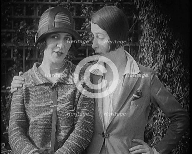 British Artists Norah Blaney and Gwen Farrah Posing for the Camera Smiling at Each Other, 1920. Creator: British Pathe Ltd.