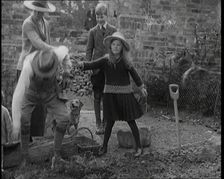 British Chancellor of the Exchequer Joseph Austen Chamberlain Working in the Garden With His...,1920 Creator: British Pathe Ltd