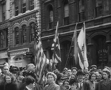 British Civilians Watching American Troops March Through London, 1942. Creator: British Pathe Ltd