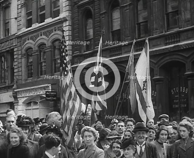 British Civilians Watching American Troops March Through London, 1942. Creator: British Pathe Ltd.