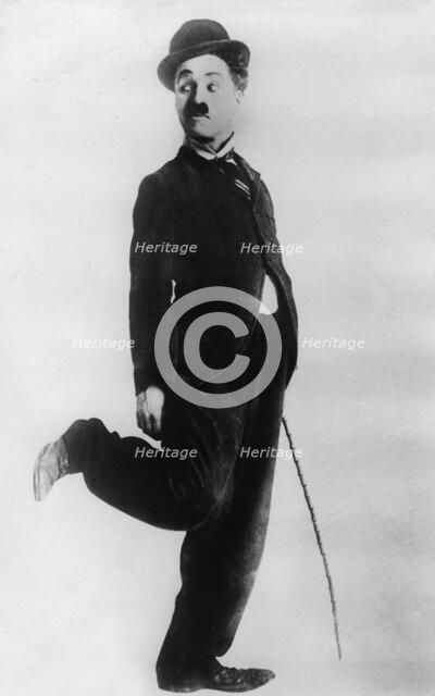 British comedian, actor and film director Charlie Chaplin in character, 20th century. Artist: Unknown
