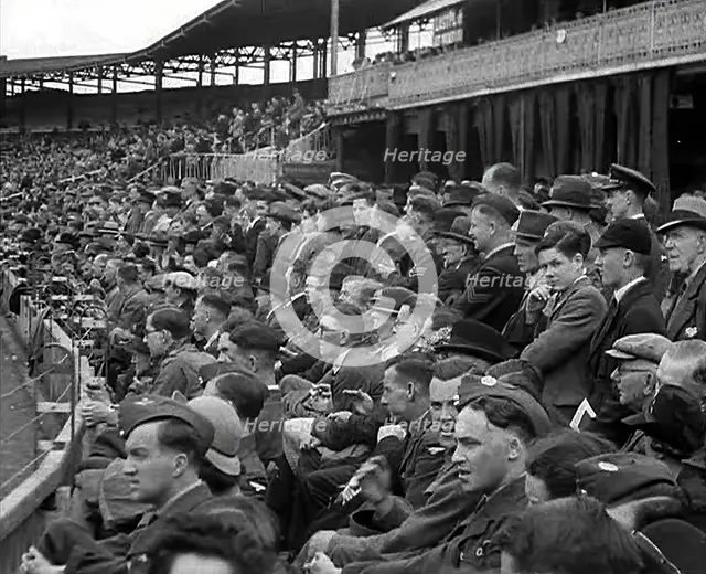 British Crowds Watching a Cricket Match, 1943-1944. Creator: British Pathe Ltd.
