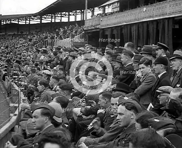 British Crowds Watching a Cricket Match, 1943-1944. Creator: British Pathe Ltd.