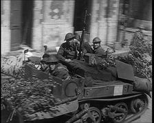 British Expeditionary Force Retreating Through Belgian Town on Vehicles, 1940. Creator: British Pathe Ltd