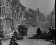 British Expeditionary Force Retreating Through Belgian Town on Vehicles, 1940. Creator: British Pathe Ltd