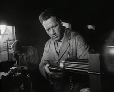 British Factory Workers Making a Machine Gun, 1941. Creator: British Pathe Ltd