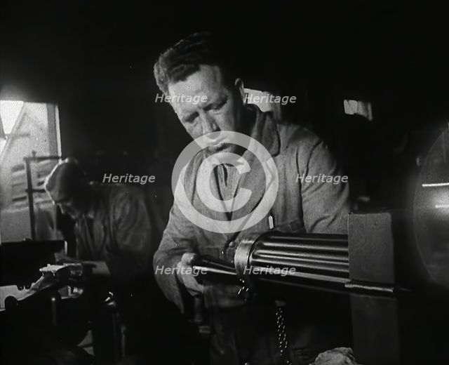 British Factory Workers Making a Machine Gun, 1941. Creator: British Pathe Ltd.