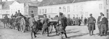 British horse-drawn artillery in a Belgian village, August 1914