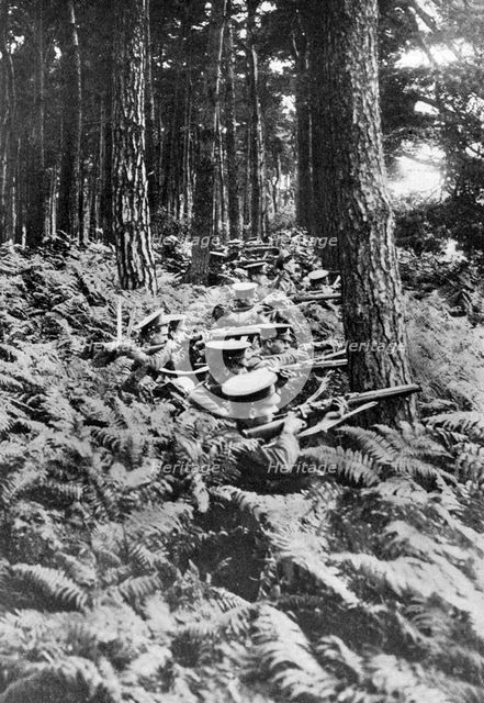 British infantry in a wood, First World War, 1914-1918, (c1920). Artist: Unknown